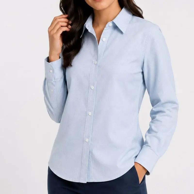 BLUSA UNILINE OXFORD MANGA LARGA AZUL CIELO